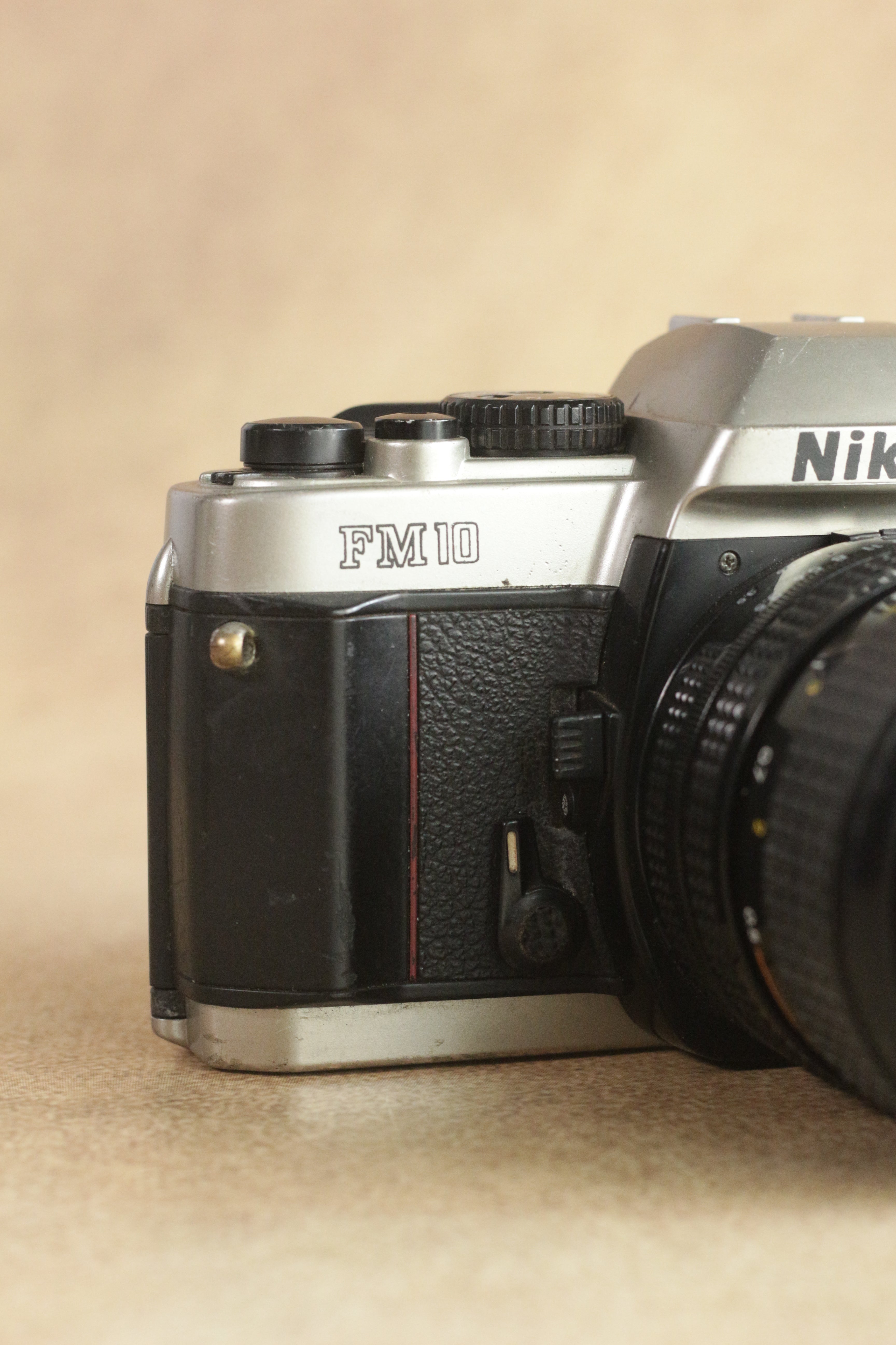 Nikon FM10 + Nikkor 35-70mm Zoom