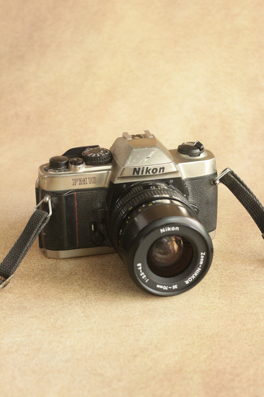 Nikon FM10 + Nikkor 35-70mm Zoom