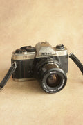 Nikon FM10 + Nikkor 35-70mm Zoom