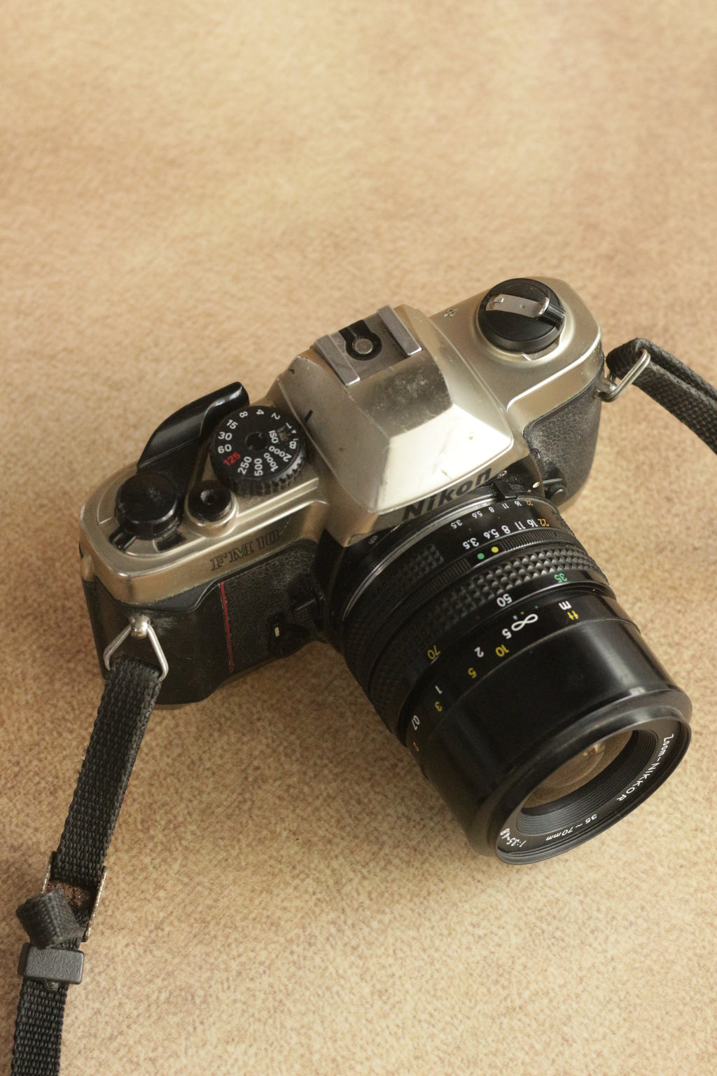 Nikon FM10 + Nikkor 35-70mm Zoom