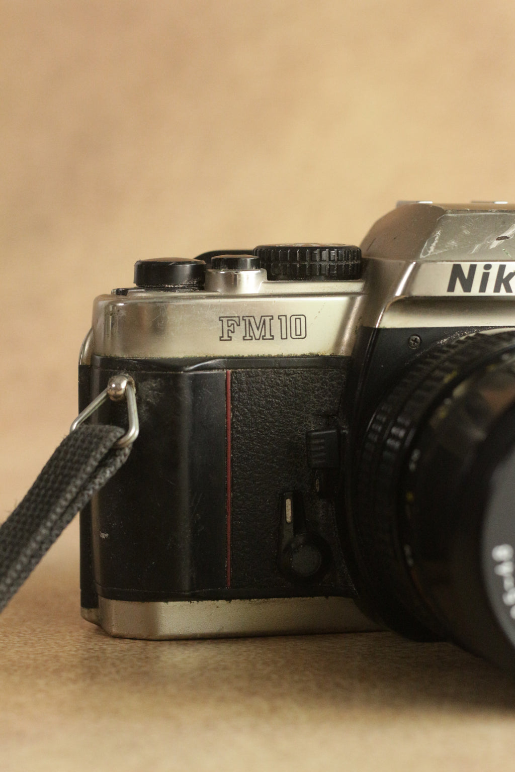 Nikon FM10 + Nikkor 35-70mm Zoom