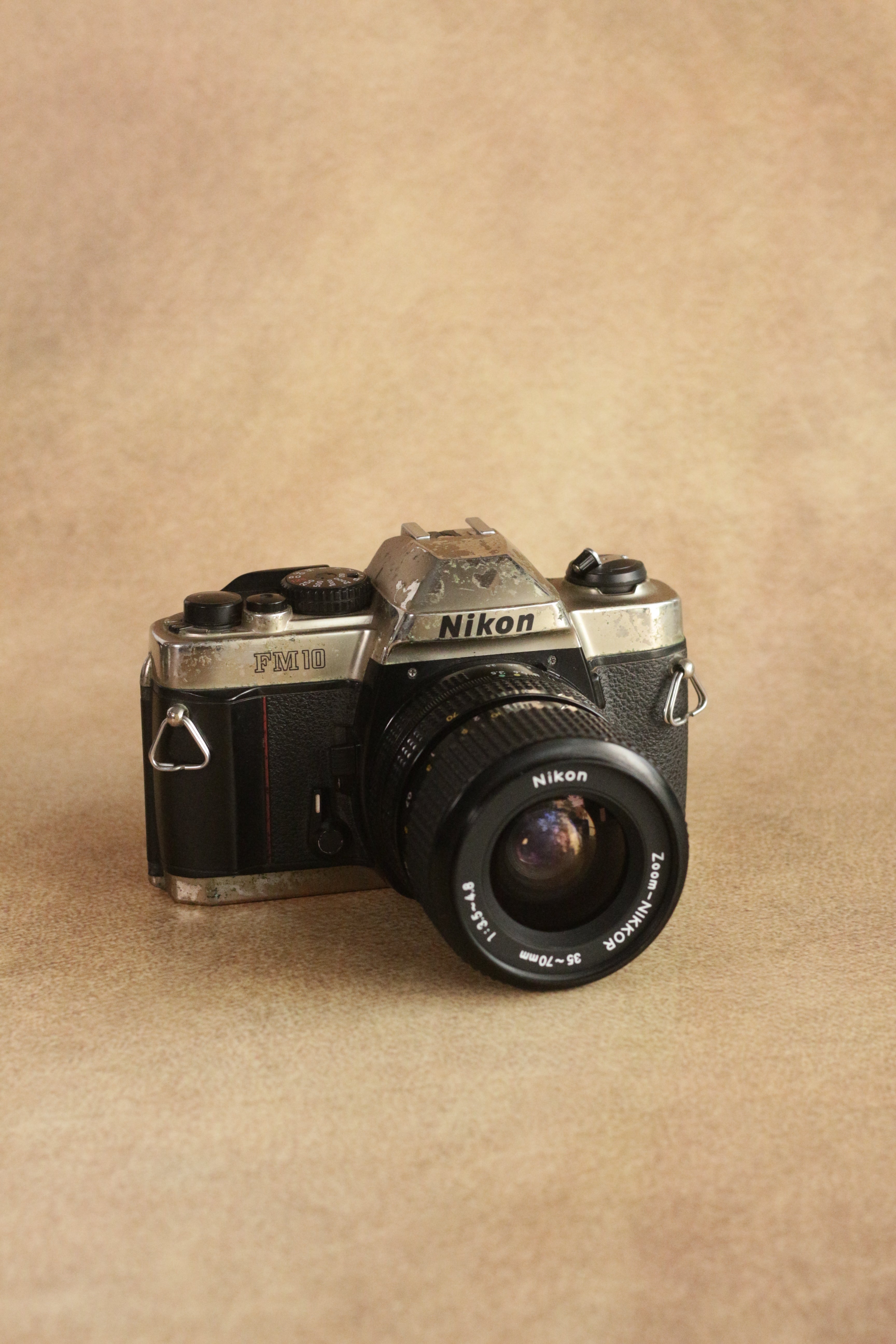 Nikon FM10 + Nikkor 35-70mm Zoom