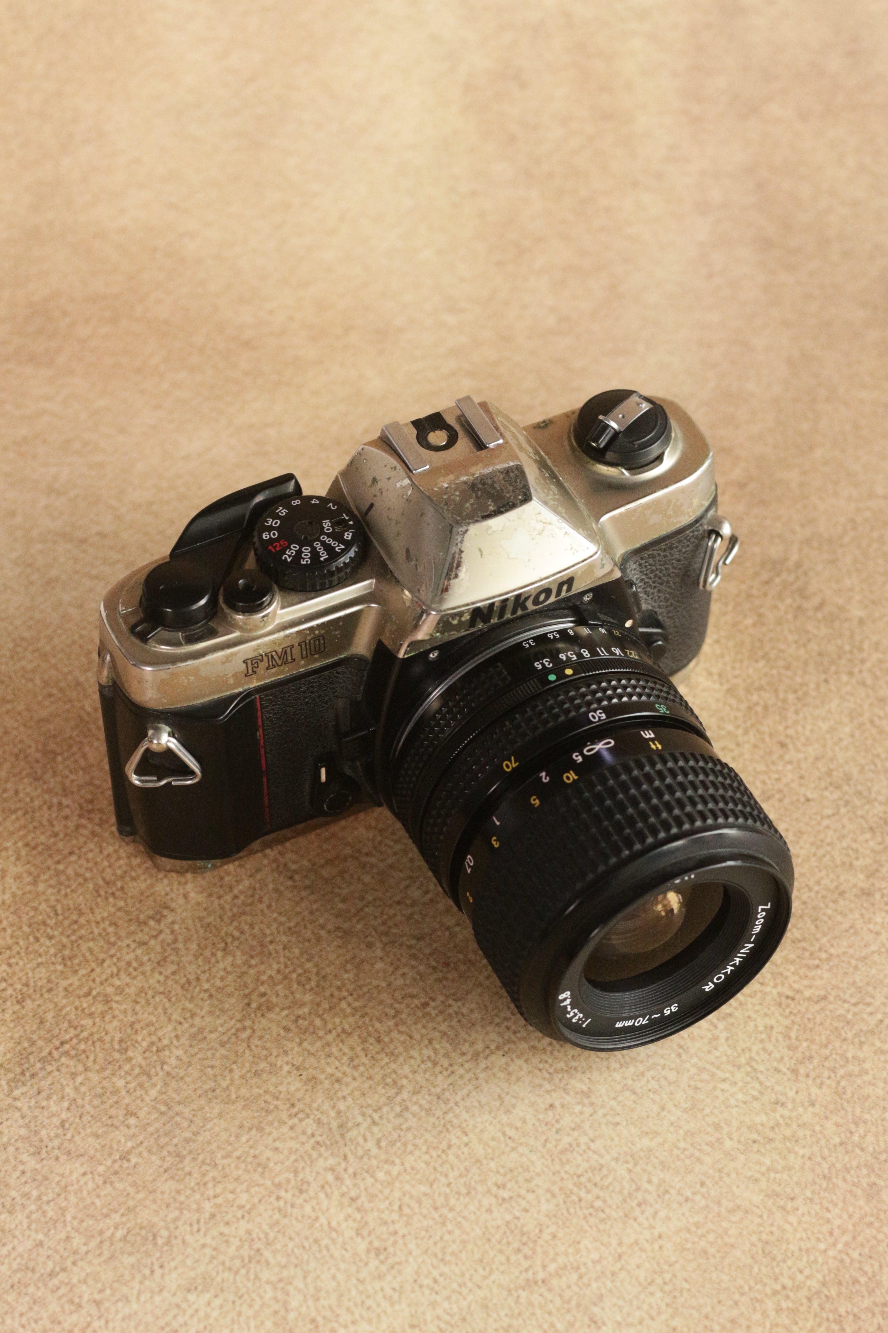 Nikon FM10 + Nikkor 35-70mm Zoom
