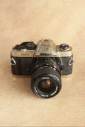 Nikon FM10 + Nikkor 35-70mm Zoom