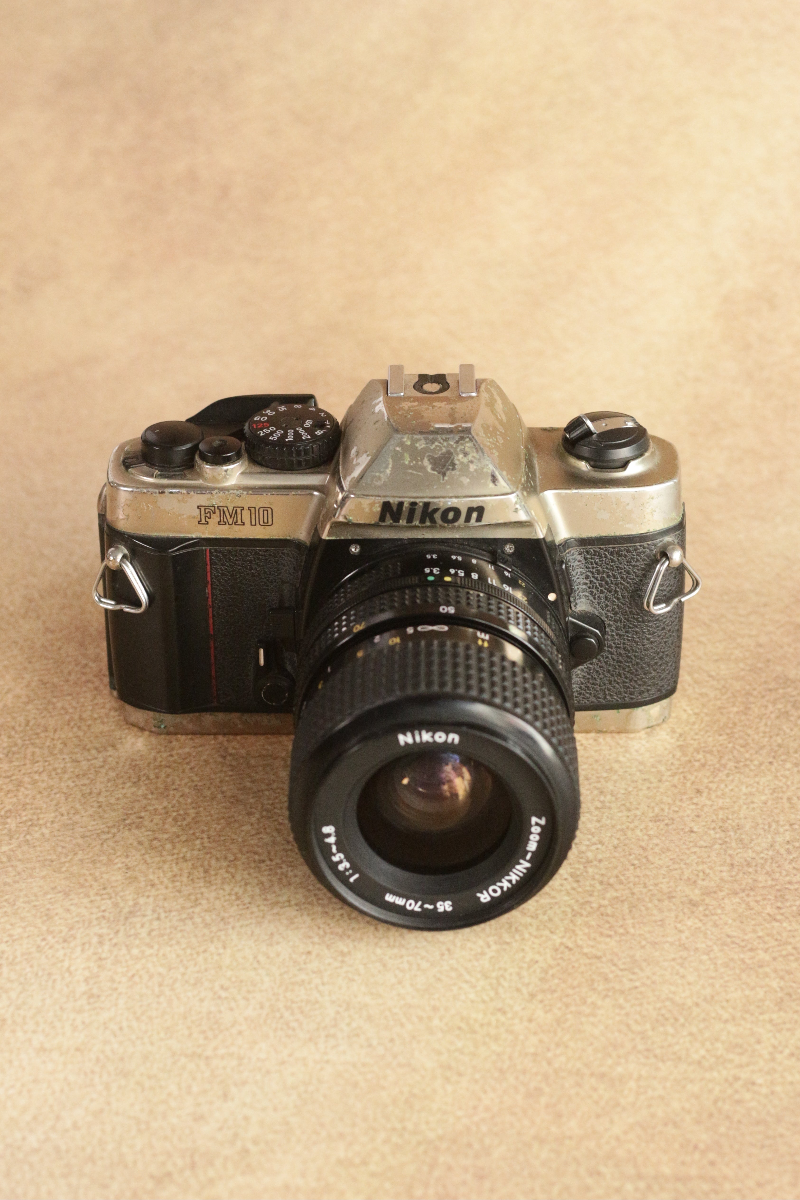 Nikon FM10 + Nikkor 35-70mm Zoom