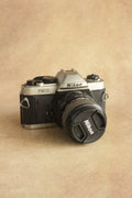 Nikon FM10 + Nikkor 35-70mm Zoom