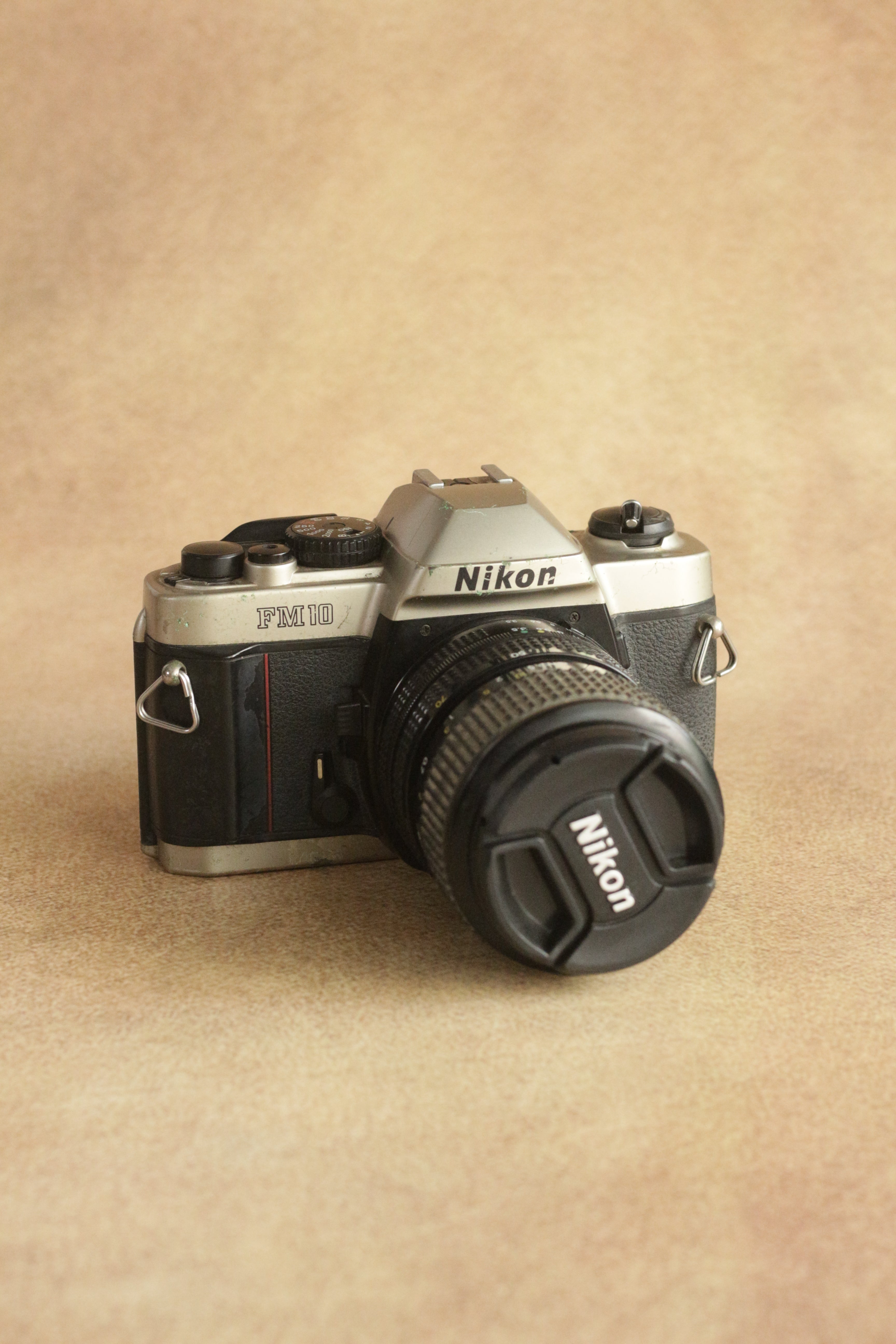 Nikon FM10 + Nikkor 35-70mm Zoom