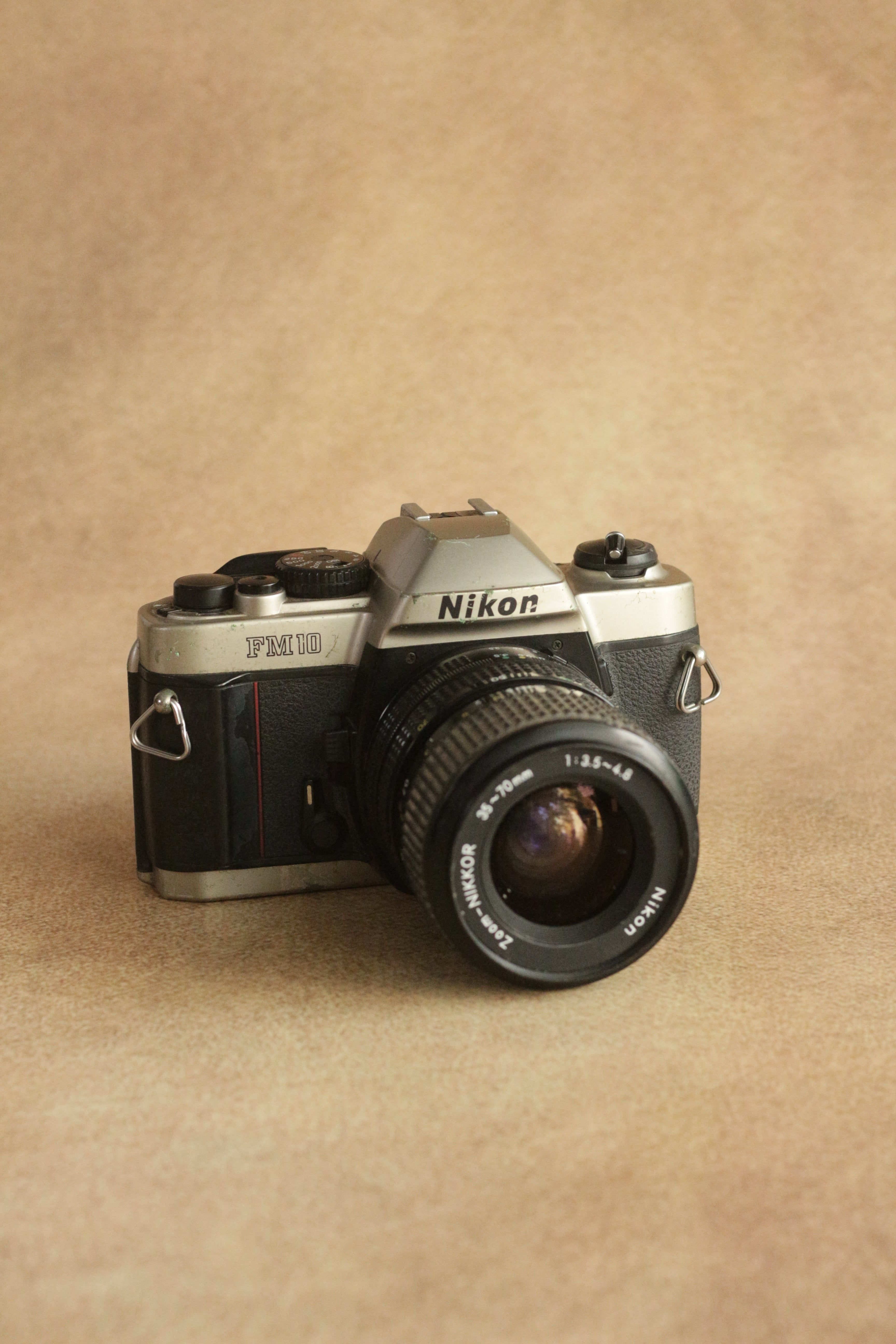 Nikon FM10 + Nikkor 35-70mm Zoom