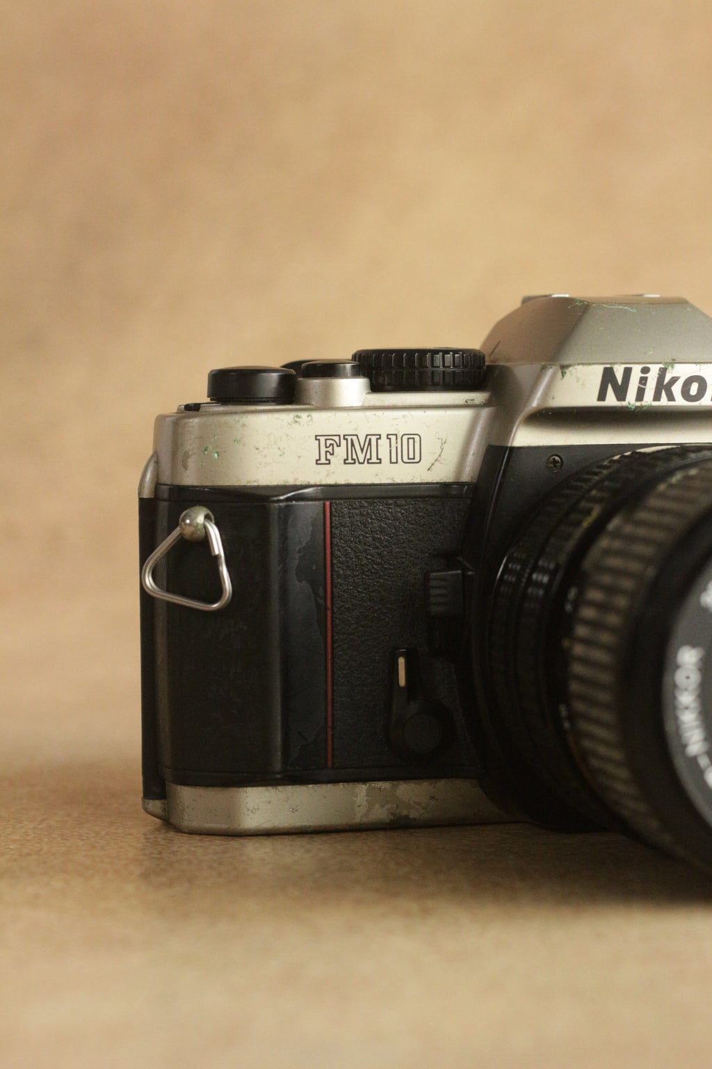 Nikon FM10 + Nikkor 35-70mm Zoom