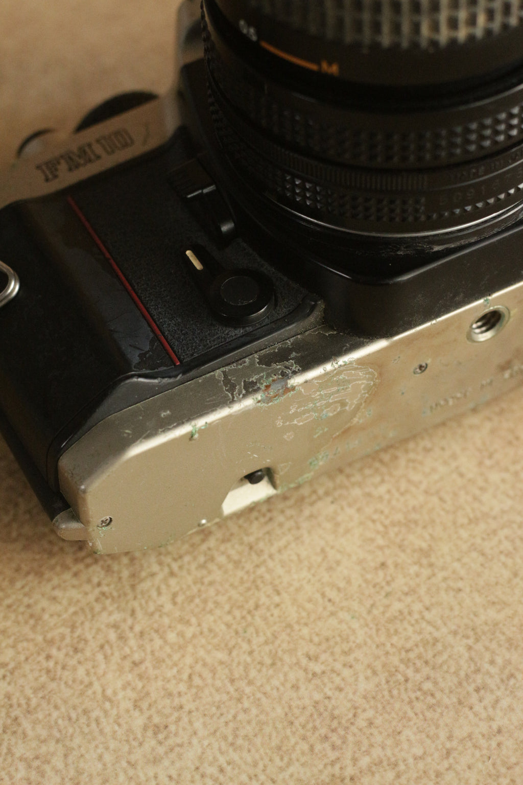 Nikon FM10 + Nikkor 35-70mm Zoom