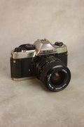 Nikon FM10 + Zoom-Nikkor 35-70mm