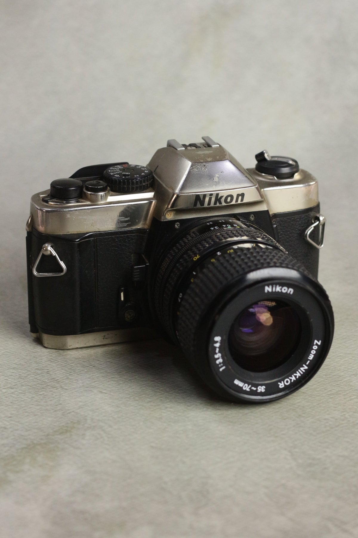 Nikon FM10 + Nikkor 35-70mm Zoom