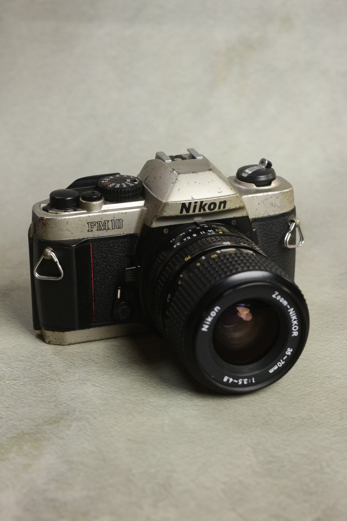 Nikon FM10 + Nikkor 35-70mm Zoom